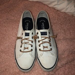 White low top sperry boatshoes.